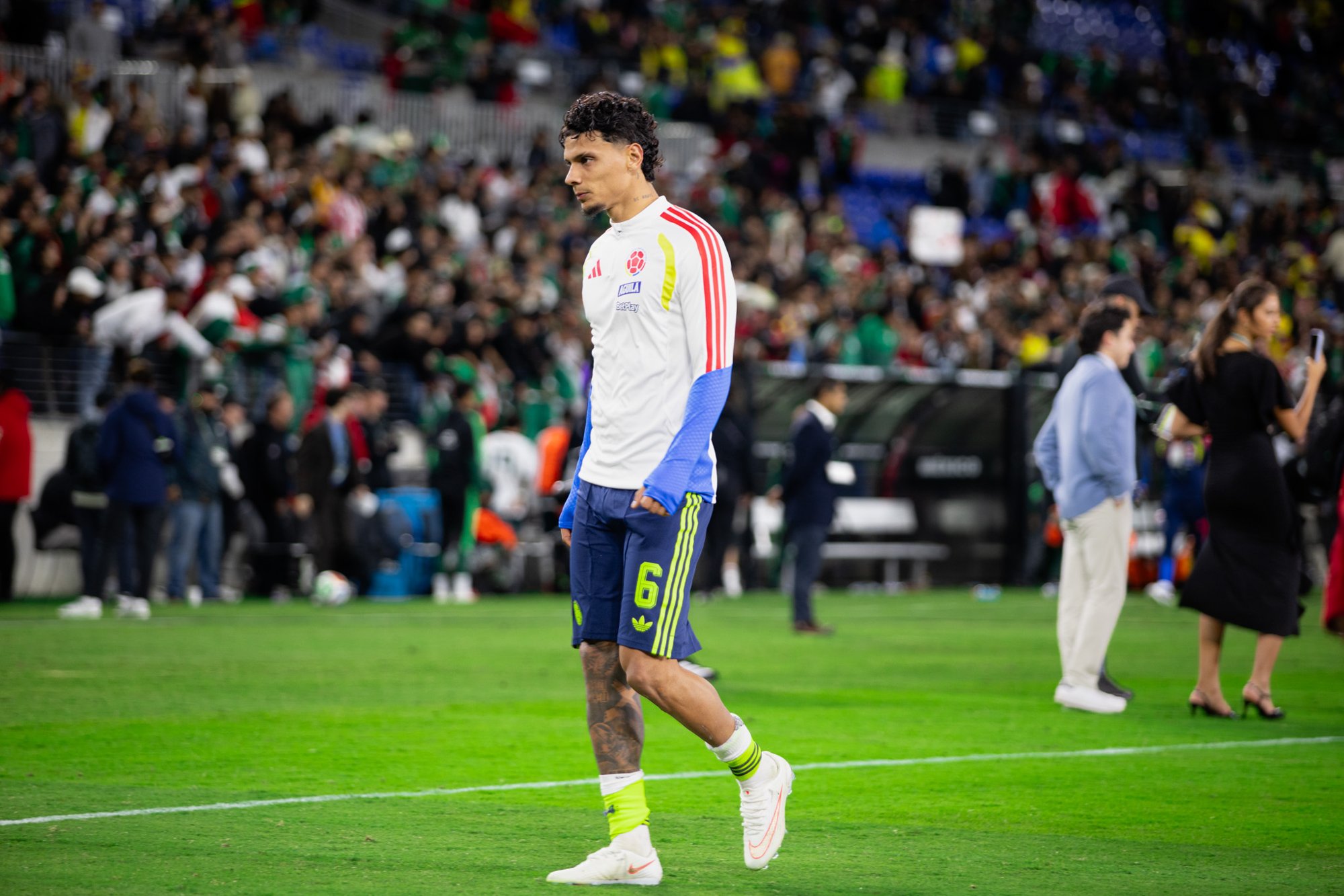 Colombia player on the pitch after the match